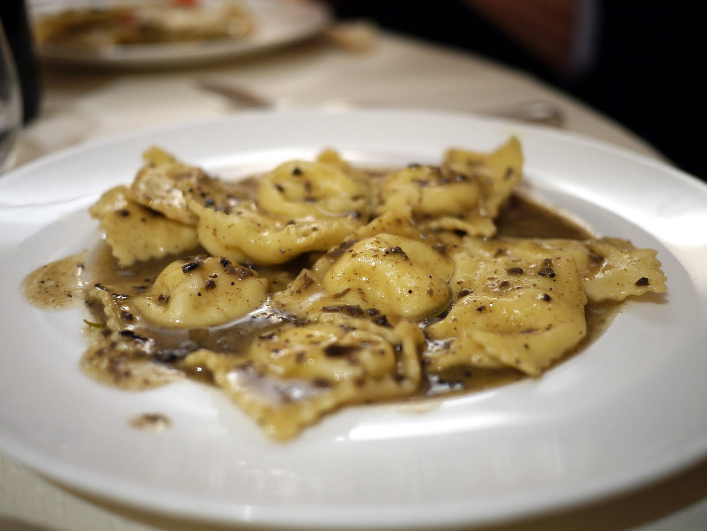 Homemade tortellini white truffle EVOO authentic Italian recipe - European gourmet pasta dish prepared with Vitalitaly premium truffle oil