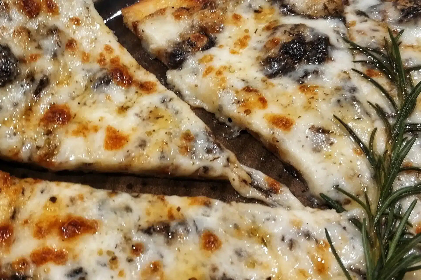 Italian pizza topped with truffle balsamic pearls — exclusive gourmet culinary experience, authentic Italian fine dining by Vitalitaly