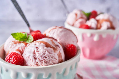 Strawberry ice cream drizzled with Spritz Balsamic Vinegar — alcohol-free Italian gourmet condiment, perfect for desserts by Vitalitaly