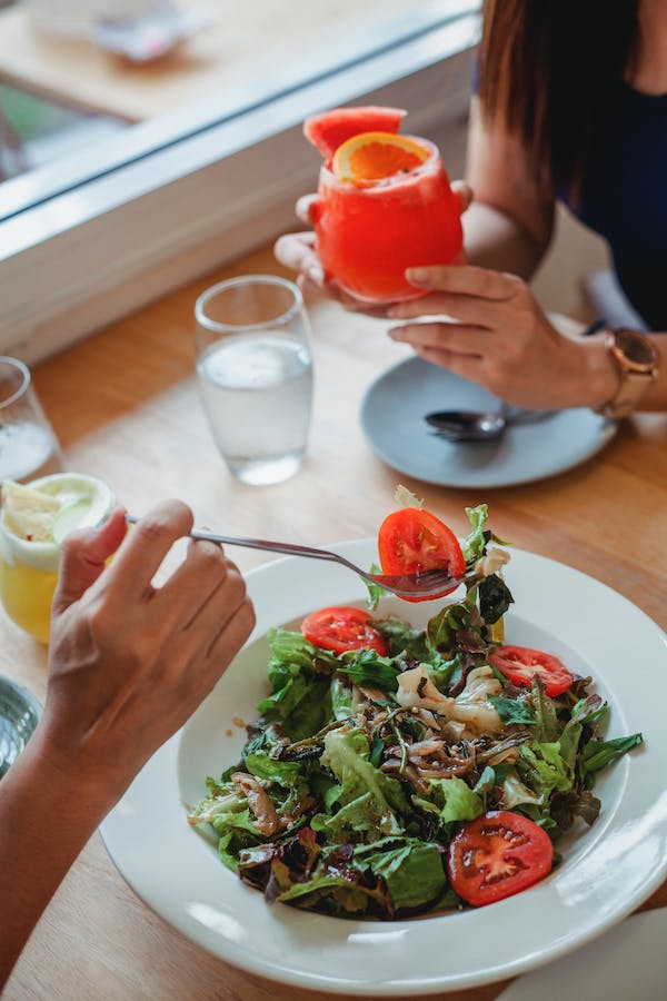 Fresh salad drizzled with Spritz Balsamic Vinegar — alcohol-free Italian gourmet condiment, vegan, perfect for light summer dishes by Vitalitaly