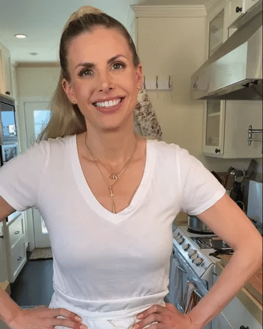 Vitalitaly happy female chef cooking satisfaction - Italian gourmet cuisine preparation, professional kitchen joy, authentic cooking experience
