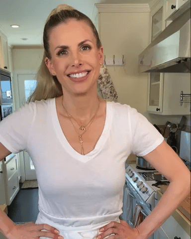 Vitalitaly happy female chef cooking satisfaction - Italian gourmet cuisine preparation, professional kitchen joy, authentic cooking experience