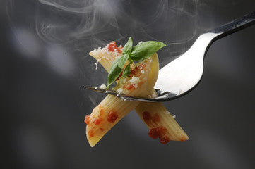 Vitalitaly Pennette on a fork — Artisan bronze-drawn Italian pasta made from 100% durum wheat for authentic everyday gourmet recipes